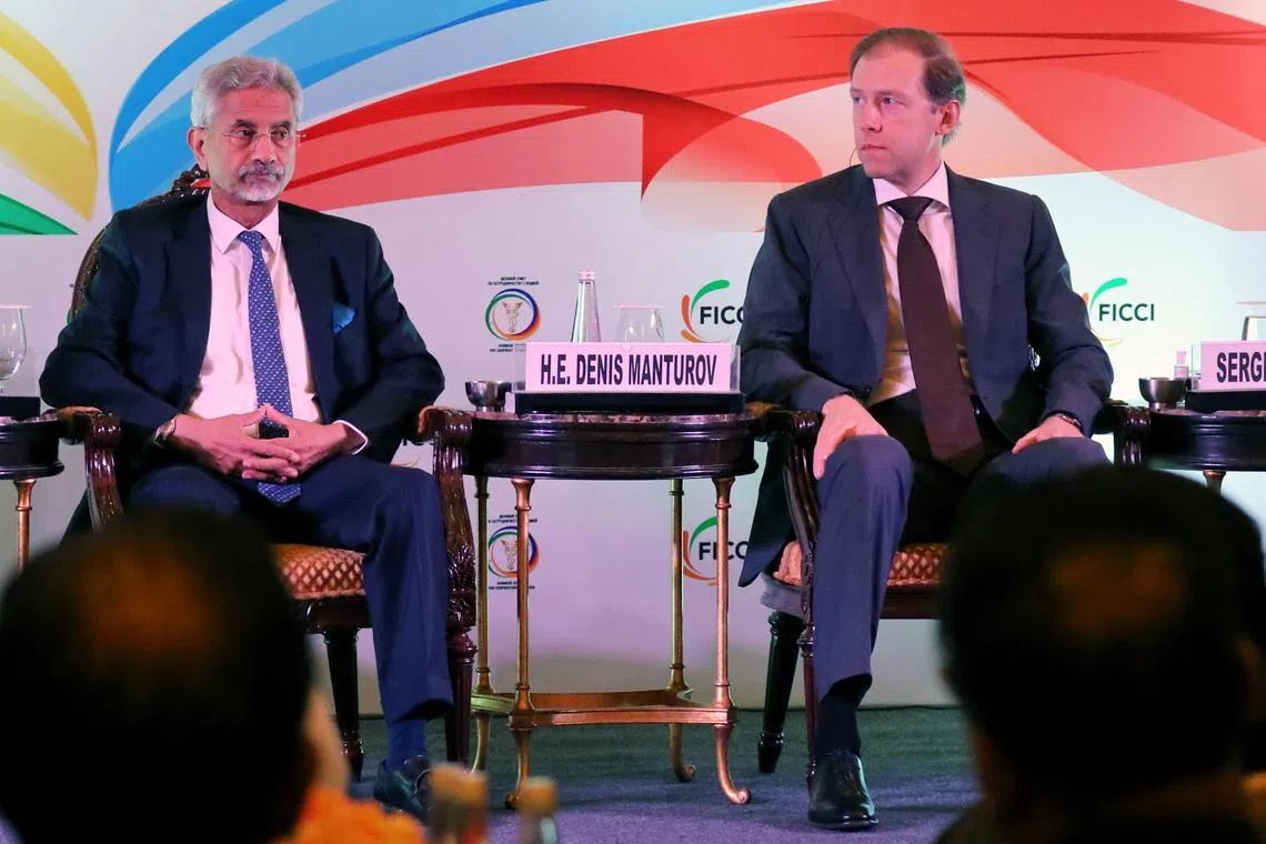 epa10576492 Deputy Prime Minister and Minister for Industry and Trade of Russian Federation Denis Valentinovich Manturov (R) and Indian Minister of External Affairs S. Jaishankar attend an India-Russia Business Dialogue in New Delhi, India 17 April 2023. The Event was organised jointly by the Federation of Indian Chambers of Commerce & Industry and the Russian Business Council for Cooperation with India, under the guidance of Indian Ministry of External Affairs.  EPA-EFE/HARISH TYAGI