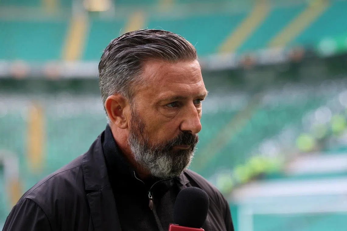 Soccer Football - Scottish Premiership - Celtic v Heart of Midlothian - Celtic Park, Glasgow, Scotland, Britain - May 16, 2026 Heart of Midlothian manager Derek McInnes speaks to media inside the stadium before the match REUTERS/Russell Cheyne