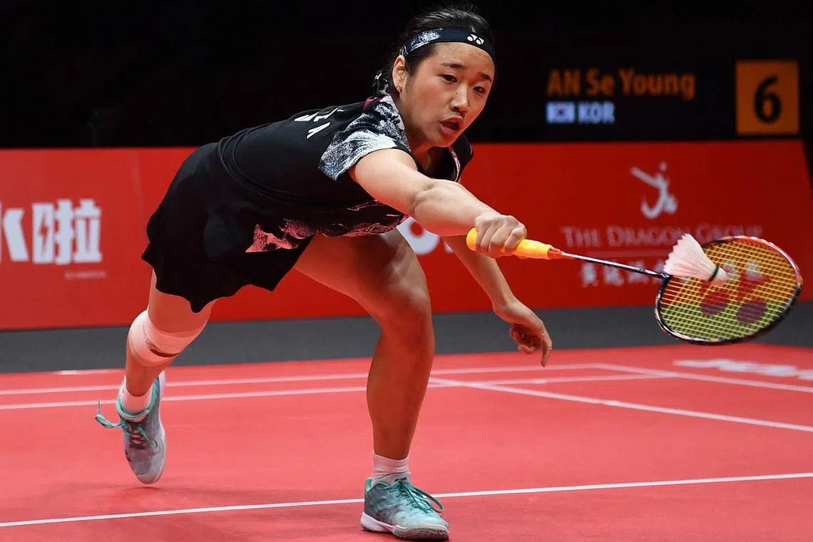 South Korea’s An Se-young hits a return to compatriot Kim Ga-eun during their match at the BWF World Tour Finals.