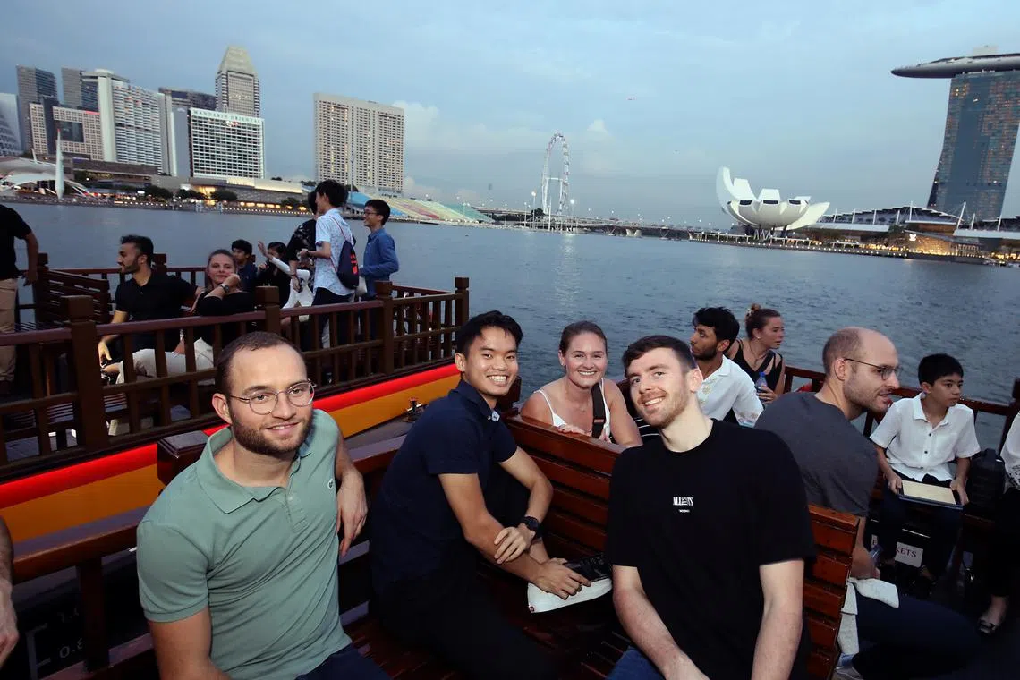 (From left) Squash players Gregoire Marche, Ng Eain Yow, Hollie Naughton and Patrick Rooney on a bumboat cruise.