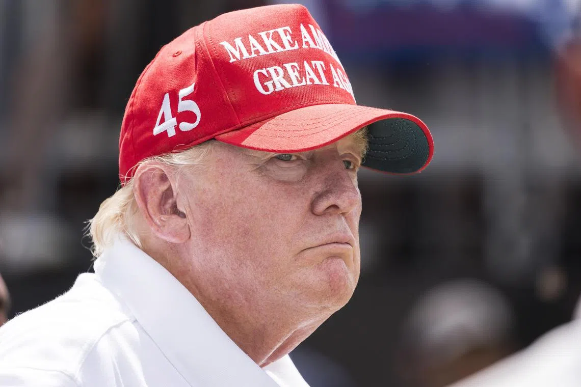 epa10551438 (FILE) - Former US President Donald. J. Trump on the 1st tee at the start of  the third round of the LIV Golf Bedminster invitational, part of the new LIV Golf Invitational Series, at the Trump National Golf Club in Bedminster, New Jersey, USA, 31 July 2022 (reissued 30 March 2023). A Manhattan grand jury has voted to indict former US President Donald J. Trump, Trump confirmed in an email on 30 March 2023.  EPA-EFE/JUSTIN LANE