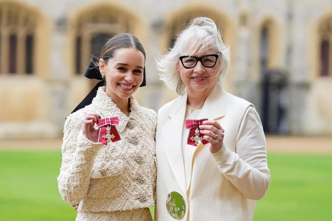 Emilia Clarke and her mother Jennifer Clarke, co-founders and trustees of SameYou, pose after being made Members of the Order of the British Empire during an investiture ceremony at Windsor Castle, Berkshire, Britain, February 21, 2024. Andrew Matthews/Pool via REUTERS   REFILE - QUALITY REPEAT