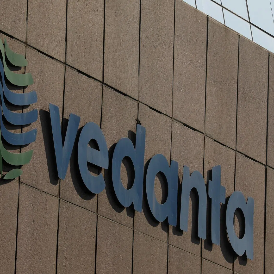 A bird flies past the logo of Vedanta installed on the facade of its headquarters in Mumbai, India January 31, 2018. REUTERS/Danish Siddiqui