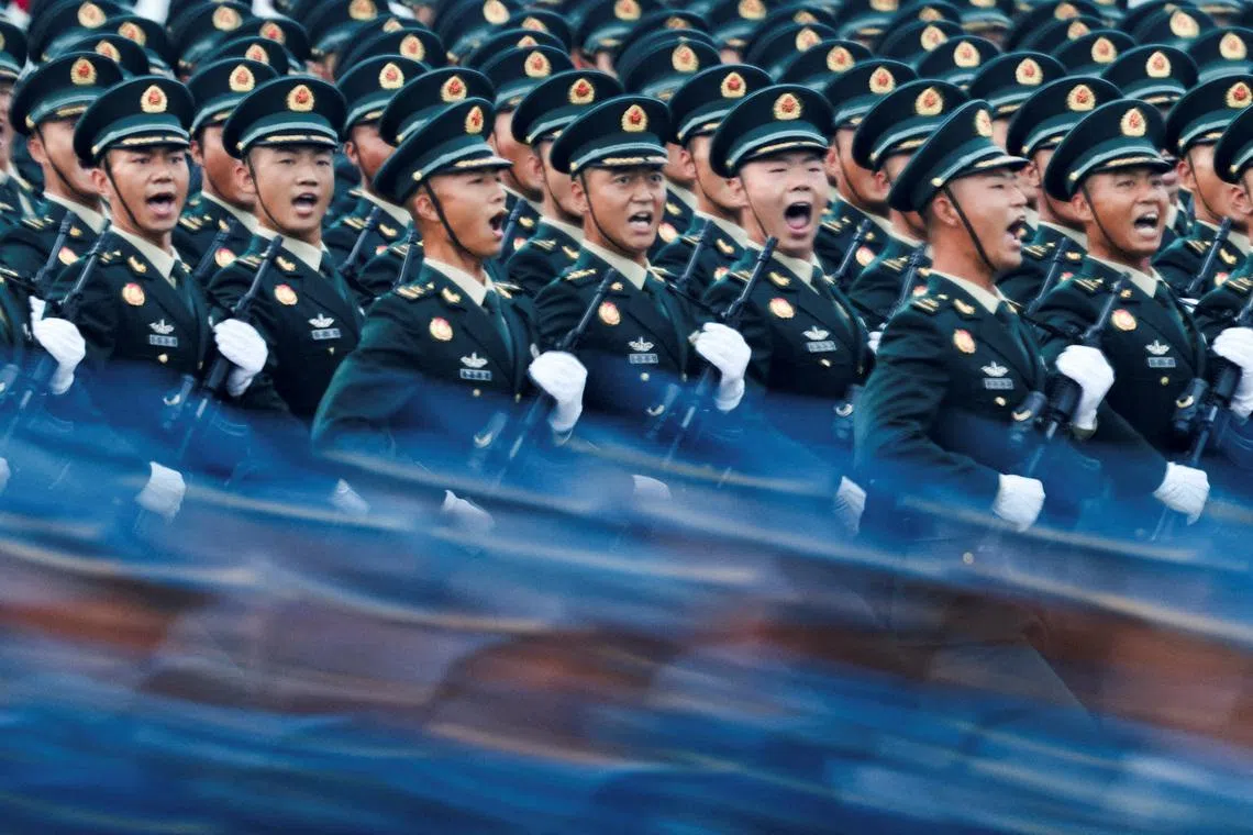 Soldiers march during the rehearsal ahead of a military parade to mark the 80th anniversary of the end of World War Two, in Beijing, China, September 3, 2025. REUTERS/Maxim Shemetov/File Photo