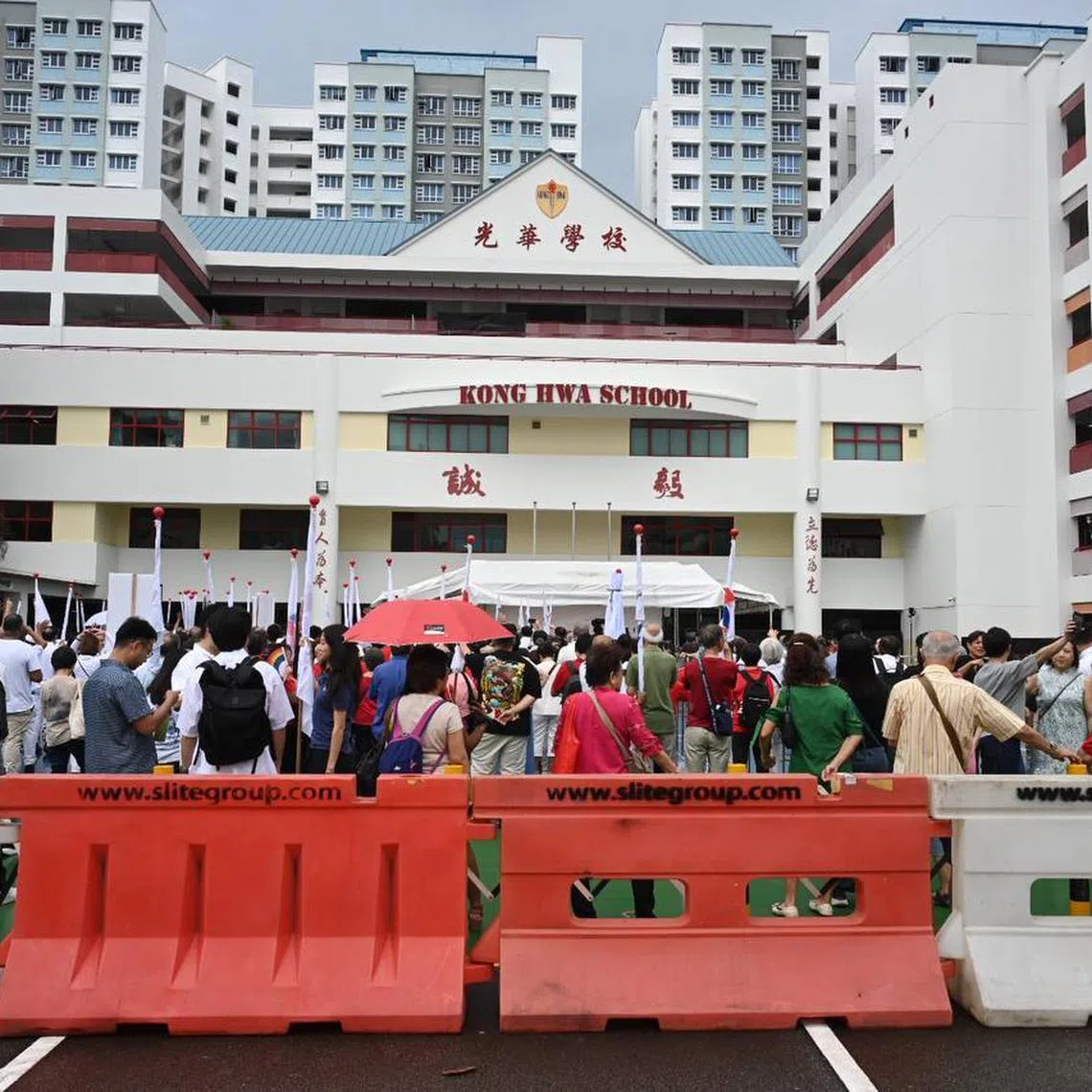Members of the public at Kong Hwa School, one of the nine the nomination centres, on April 23.