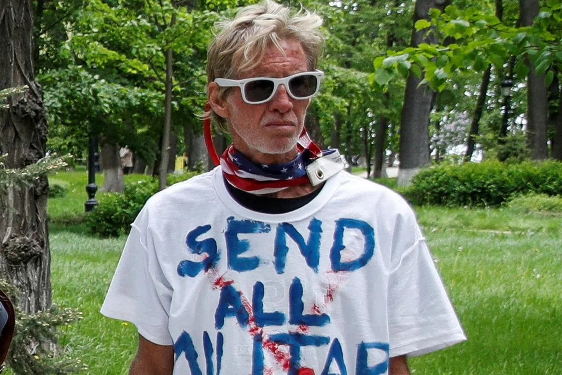 Ryan W. Routh, a suspect identified by news organizations, as the FBI investigates what they said was an apparent assassination attempt in Florida on Republican presidential nominee and former U.S. President Donald Trump, is seen during a rally demanding China's leader's assistance to organise an extraction process for Ukrainian service members from Azovstal Iron and Steel Works in Mariupol, in Kyiv, Ukraine May 17, 2022. REUTERS/Valentyn Ogirenko/File Photo