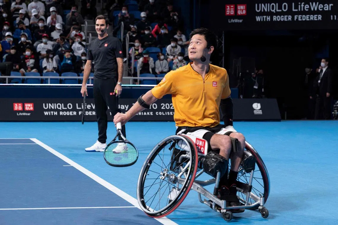 Japanese wheelchair player Shingo Kunieda takes part in a promotional event with retired tennis legend Roger Federer in November 2022.