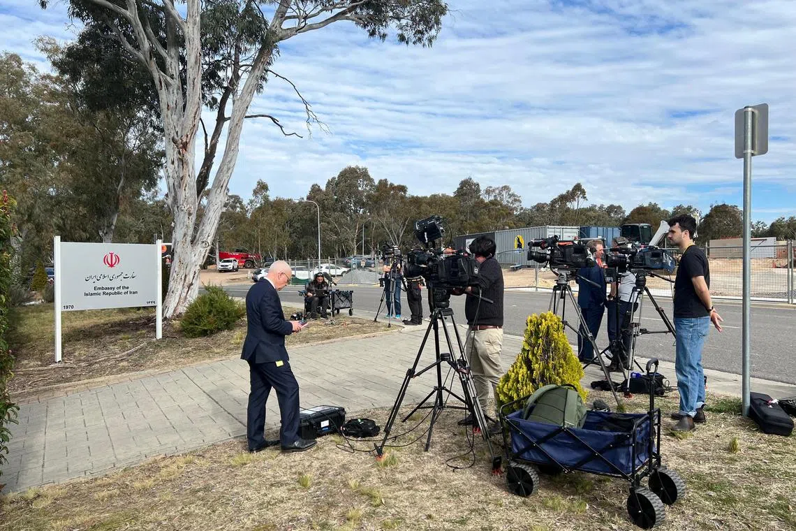 Members of the media outside the Embassy of the Islamic Republic of Iran in Canberra, Australia on Aug 26. The ambassador was expelled after accusations that Tehran was behind antisemitic arson attacks.