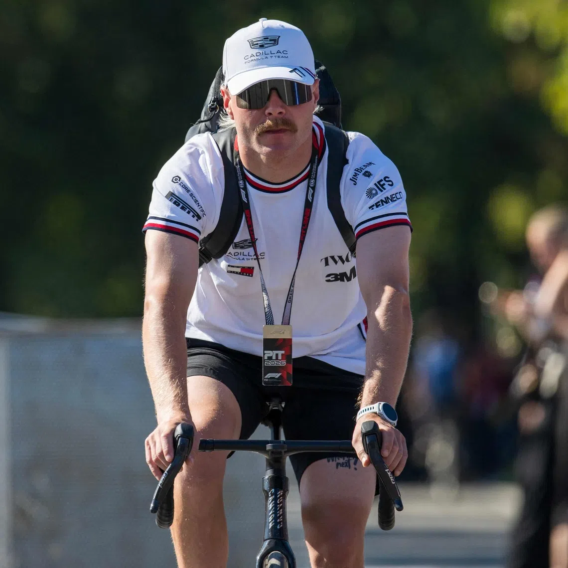 Cadillac’s Valtteri Bottas arrives in the paddock with a bicycle ahead of the Italian Formula One Grand Prix at the Autodromo Nazionale Monza circuit in Monza, Italy on Sept 4, 2026.