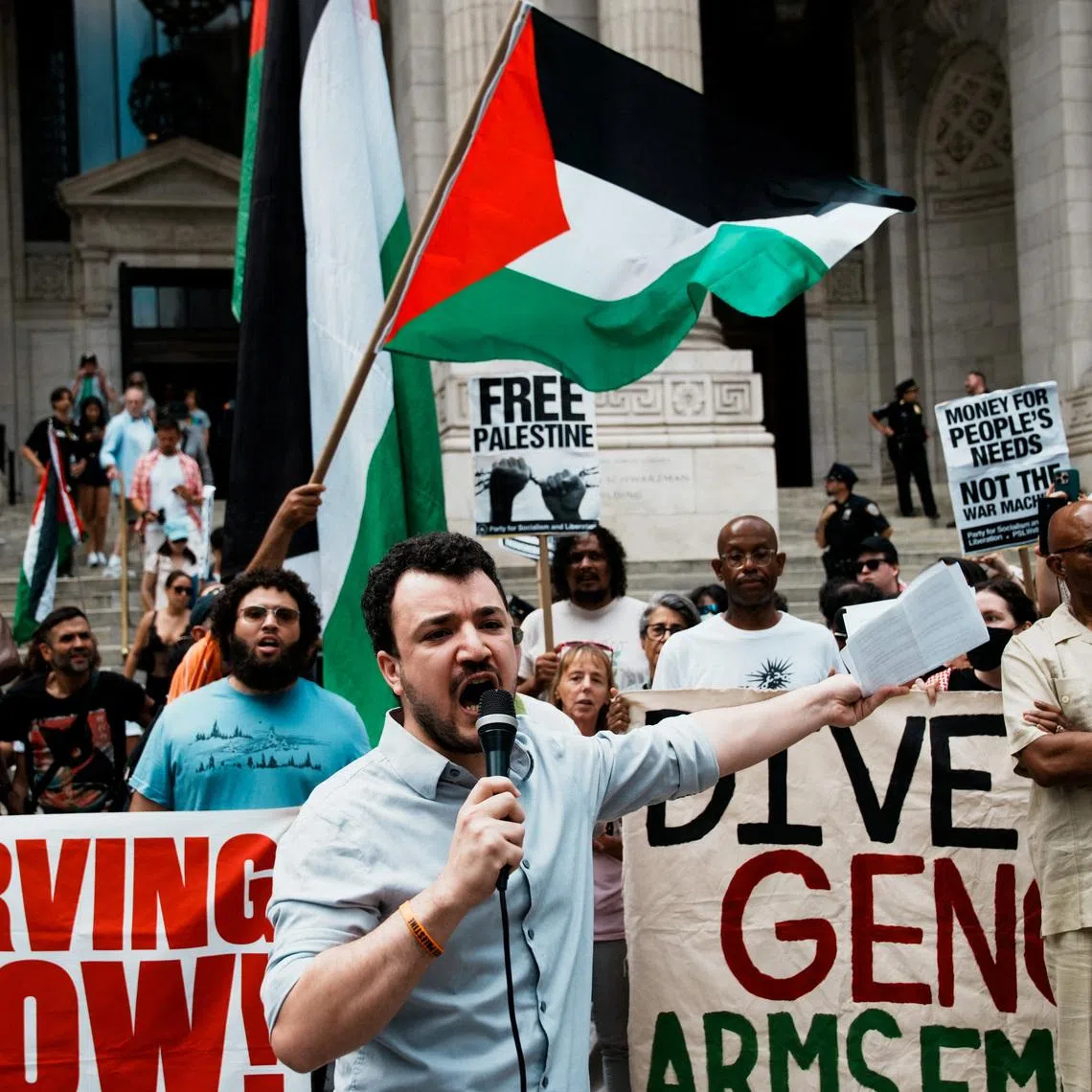 Mahmoud Khalil speaks to people as they gather at Bryant Park, to participate in a \"Stop starving Gaza\" march during the ongoing conflict between Israel and Hamas, in New York City, U.S., August 16, 2025. REUTERS/Eduardo Munoz