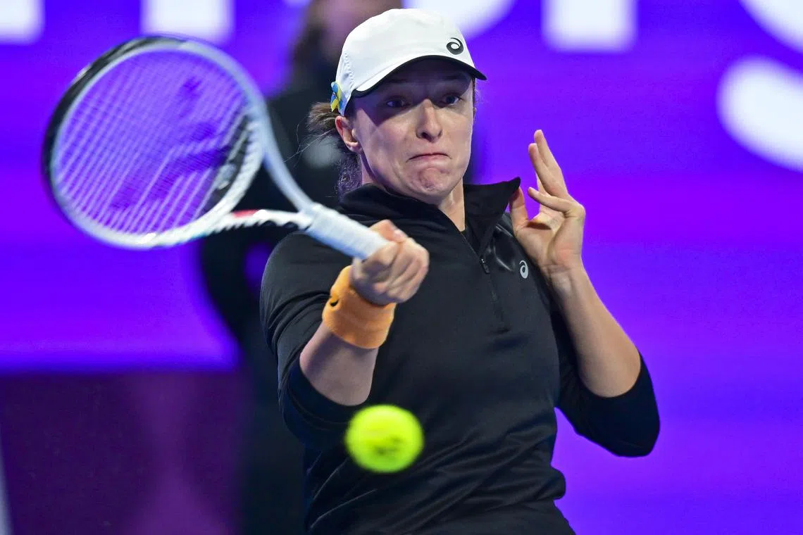 Iga Swiatek of Poland in action during her final match against Jessica Pegula of United States at the WTA Qatar Open Tennis tournament, in Doha, Qatar on Saturday. Swiatek won 6-3, 6-0.