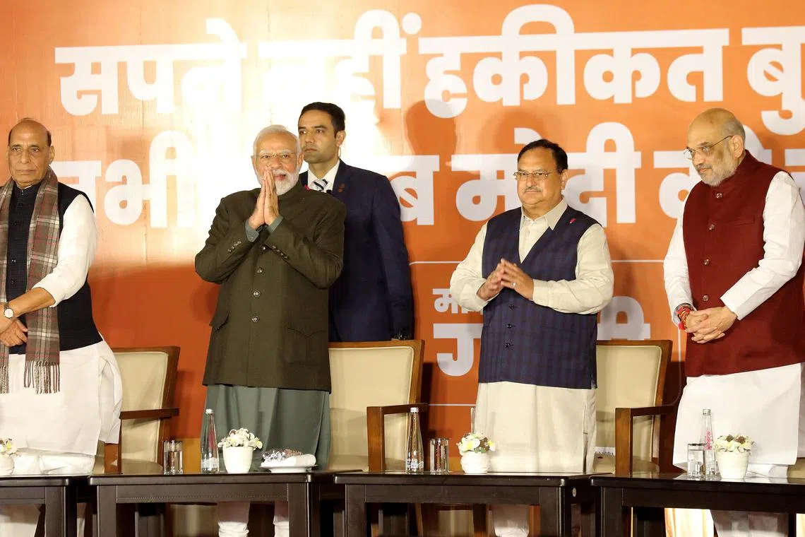 epa11009625 Indian Prime Minister Narendra Modi (2-L), Bharatiya Janata Party (BJP) President Jagat Prakash Nadda (2-R), Indian Home Minister Amit Shah (R) and Indian Defence Minister Rajnath Singh (L) at the Bharatiya Janata Party (BJP) headquarters in New Delhi, India, 03 December 2023. The results of the assembly elections in Rajasthan, Chhattisgarh, Madhya Pradesh, and Telangana were announced on 03 December. The Bharatiya Janata Party (BJP) won the most seats in Rajasthan, Chhattisgarh, and Madhya Pradesh, while the Congress party emerged victorious in Telangana. Millions of Indian citizens cast their vote across the five states that held Assembly elections.  EPA-EFE/RAJAT GUPTA