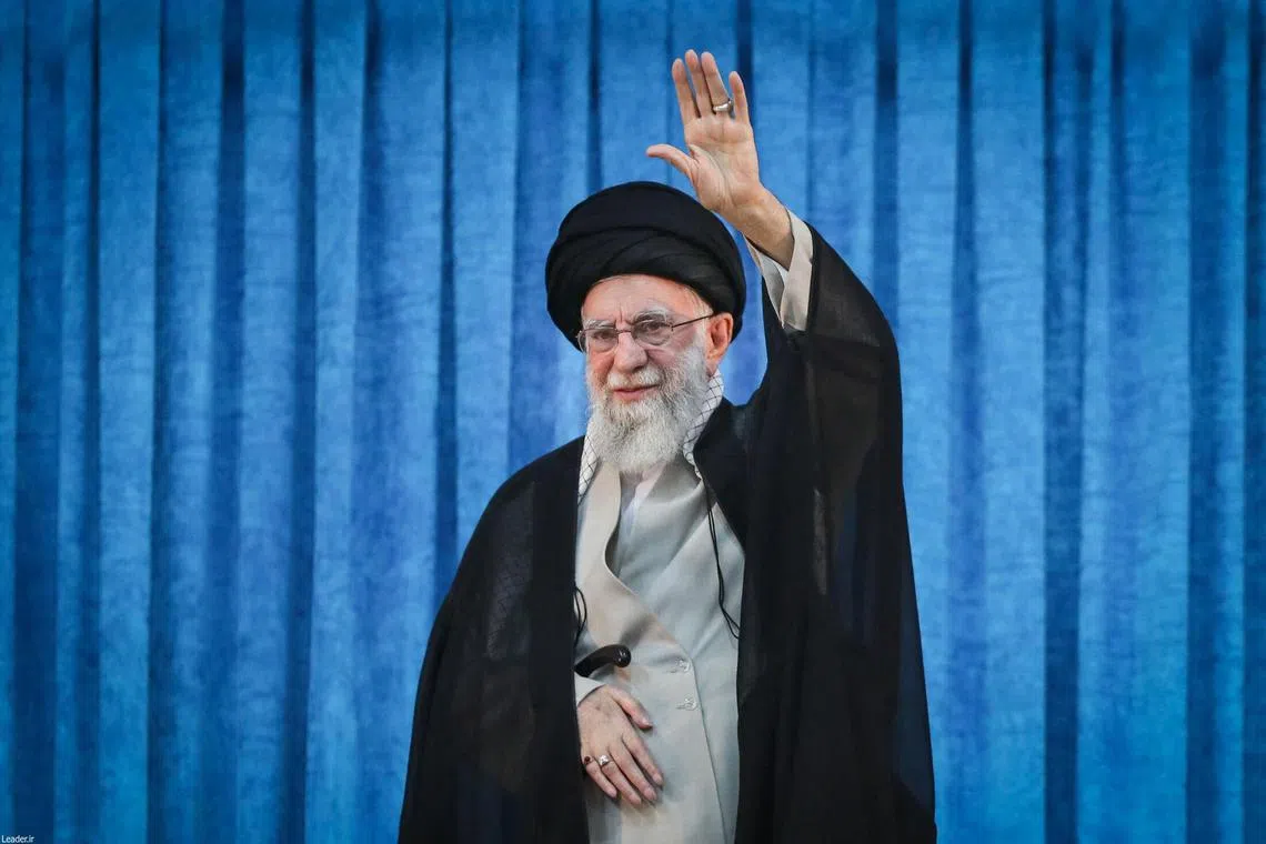 Iranian supreme leader Ayatollah Ali Khamenei waving during a ceremony on the occasion of 36rd death anniversary of Ayatollah Ruhollah Khomeini, in Tehran on June 4, 2025.