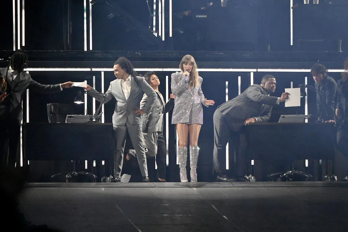 Taylor Swift took the stage with her backup dancers on 2 March 2024 at the National Stadium for The Eras Tour .