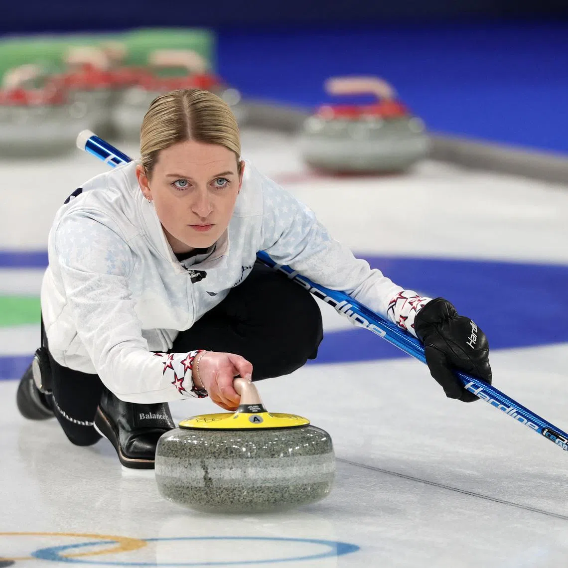 Milano Cortina 2026 Olympics - Curling - Mixed Doubles Semi-final - Italy vs United States of America - Cortina Curling Olympic Stadium, Cortina d'Ampezzo, Italy - February 09, 2026. Cory Thiesse of United States in action with Korey Dropkin of United States against Amos Mosaner of Italy and Stefania Constantini of Italy REUTERS/Issei Kato