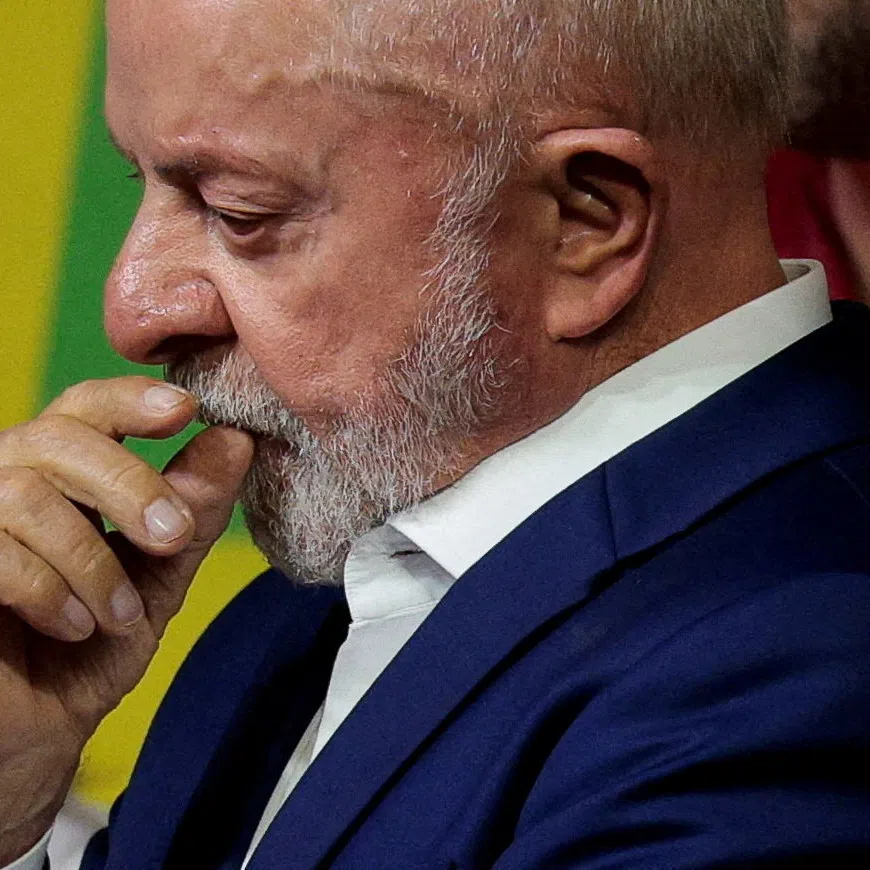 Brazilian President Luiz Inacio Lula da Silva, the Workers' Party (PT) candidate for presidential re-election, reacts during an address to supporters after the country's electoral authority said Liberal Party (PL)'s candidate Flavio Bolsonaro will face Lula in the runoff of a presidential election, in Sao Paulo, Brazil October 4, 2026. REUTERS/Brian Snyder