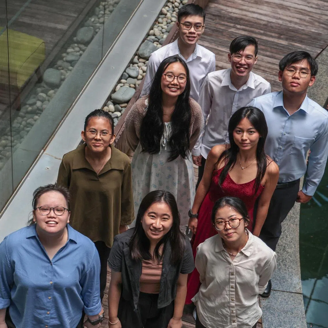 Nine recipients of SPH Foundation's Lim Kim San Memorial Scholarship, which is awarded to students from humble family backgrounds.