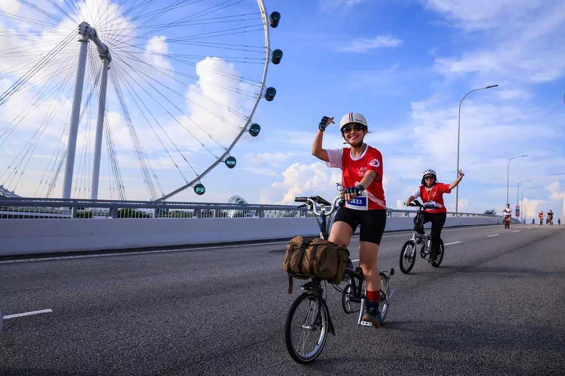 A participant cycling along the scenic route on Benjamin Sheares Bridge during the OCBC Cycle.