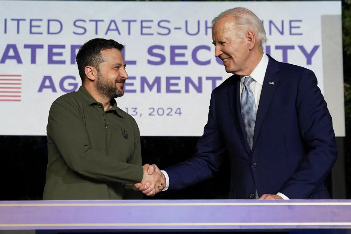 Ukraine President Volodymyr Zelensky (left) and US President Joe Biden signed a 10-year bilateral security agreement on the sidelines of the G-7 summit in Italy.