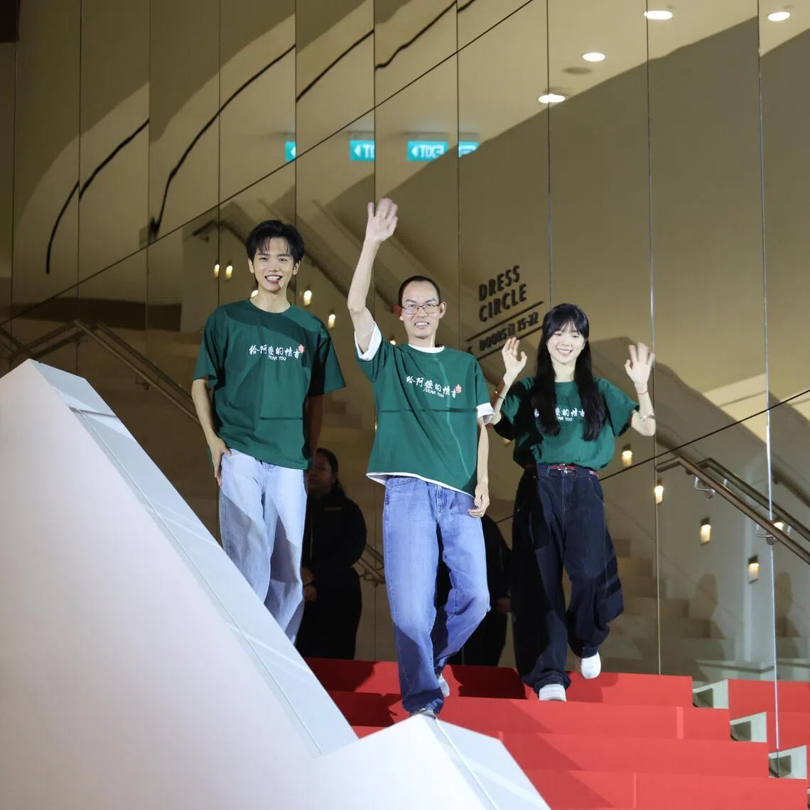 (From left) Chinese film Dear You's actor Wang Yantong, director Lan Hongchun and actress Li Sitong arriving at Sands Theatre on June 16 ahead of its gala premiere.