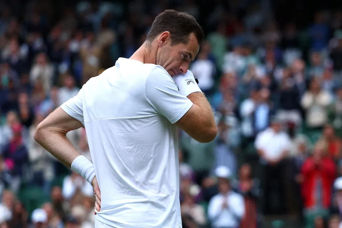 Britain's Andy Murray wept openly on Wimbledon's Centre Court, after he and brother Jamie were defeated in the men's doubles.  