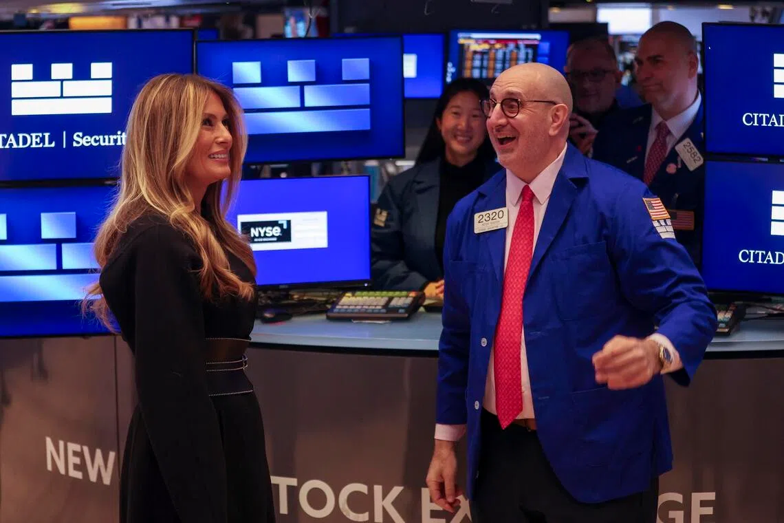 First Lady of the United States Melania Trump (left) speaking to traders at the New York Stock Exchange on Jan 28, before ringing the opening bell.