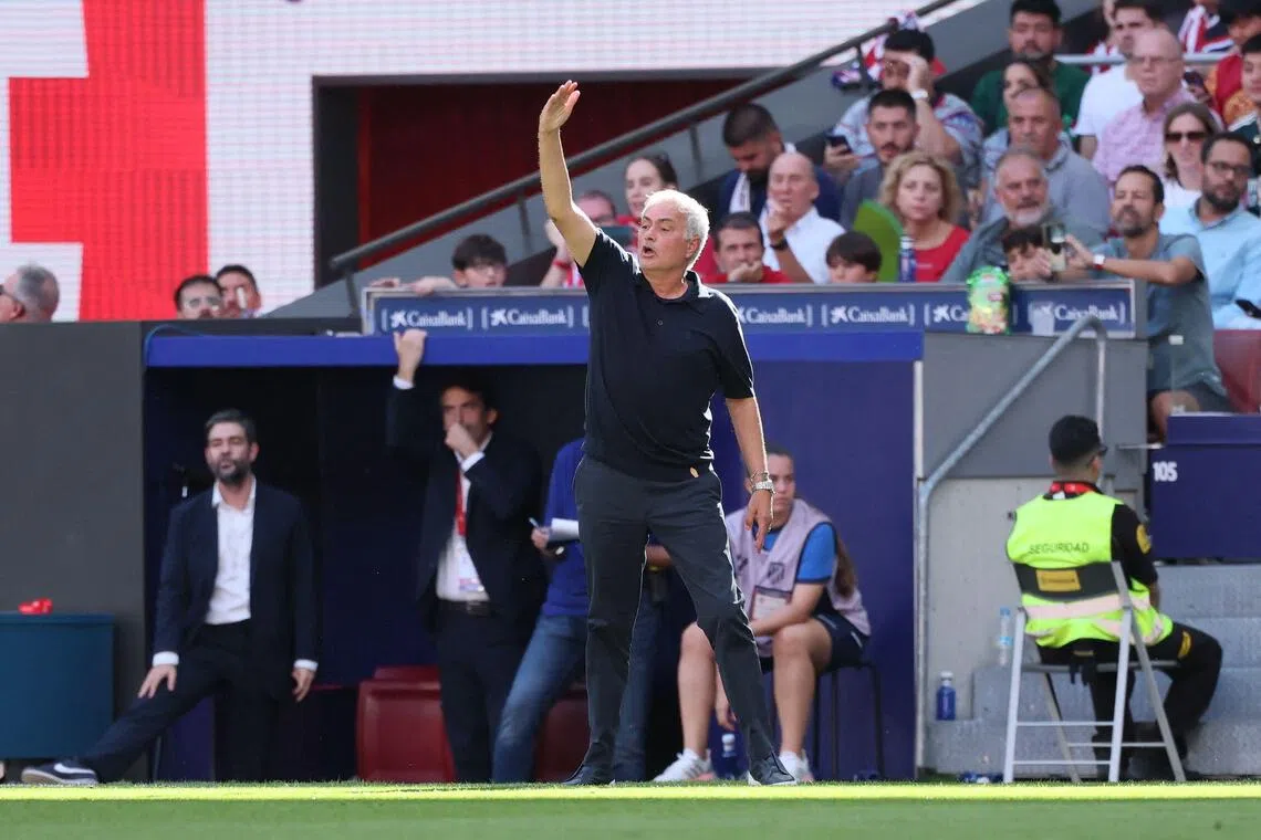 Real Madrid’s Portuguese coach Jose Mourinho gesturing to players during his side’s 2-1 La Liga loss to Atletico Madrid at the Metropolitano in Madrid on Sept 20.