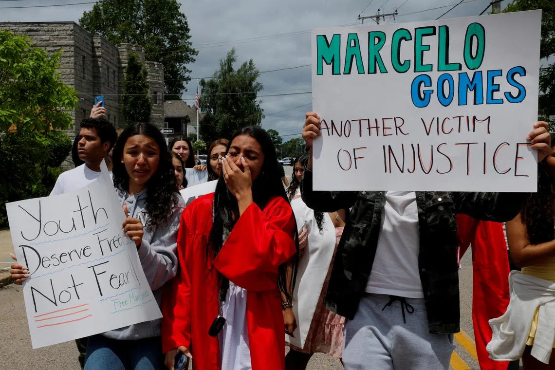 FILE PHOTO: Classmates of Marcelo Gomes da Silva, who was reportedly detained by Immigration and Customs Enforcement (ICE) agents, join members of the community at a rally in support of da Silva after their high school graduation in Milford, Massachusetts, U.S., June 1, 2025.   REUTERS/Brian Snyder/File Photo
