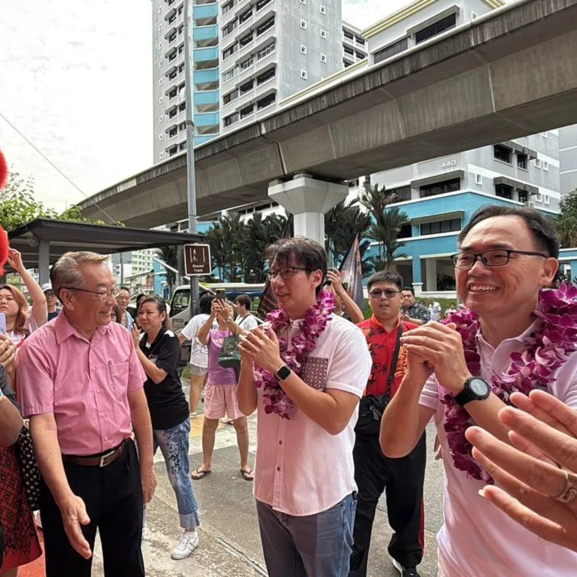 Bukit Panjang MP-elect Liang Eng Hwa (right) and Holland-Bukit Timah MP-elect Edward Chia (centre) at a Mother's Day event on May 4.