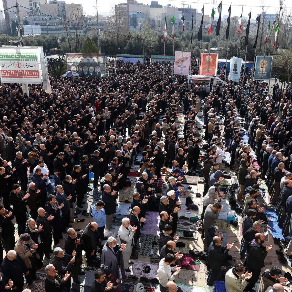 Iranians take part in Eid al-Fitr prayers in Tehran, Iran on March 21 .