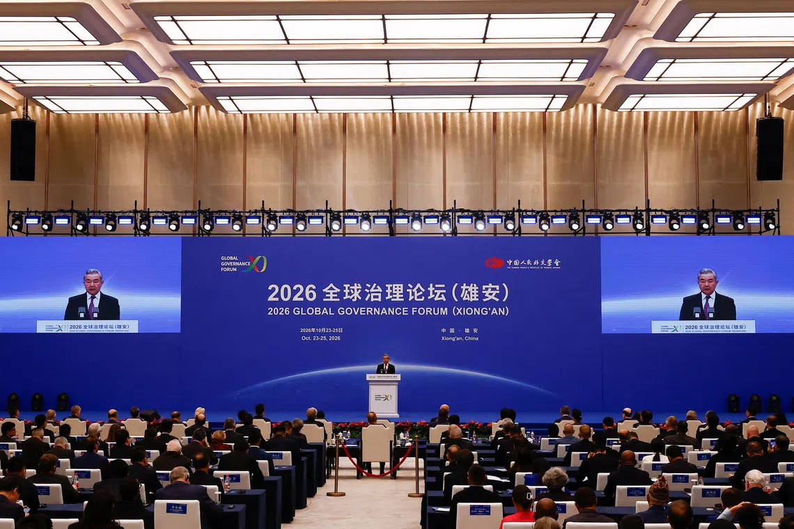 Chinese Foreign Minister Wang Yi delivers the speech during the opening ceremony for the inaugural Global Governance Forum in Xiongan New Area, Hebei province, China, October 23, 2026. REUTERS/Maxim Shemetov