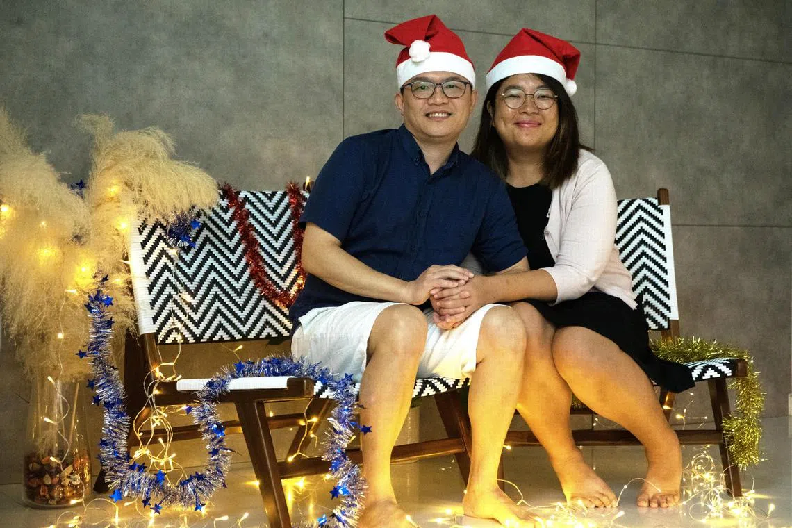 Mdm Jamie Yeow (right), 42, and her husband, Mr Ng Choe Kee, 44 photographed at their home in 63A Lengkok Bahru in Singapore on 22 Dec 2022.