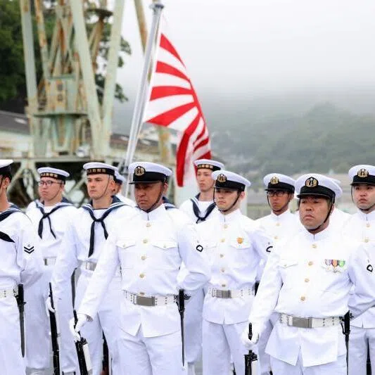 Members of the Japan Maritime Self-Defense Force aboard a Mogami-class stealth frigate May 21, 2026. 