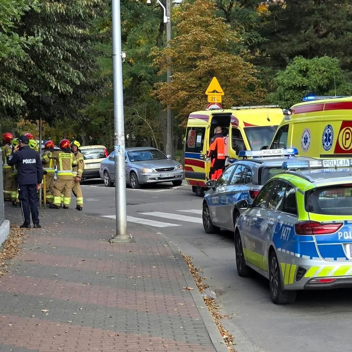 Police said the suspect was a student at the school and that he had attacked people with a machete. 