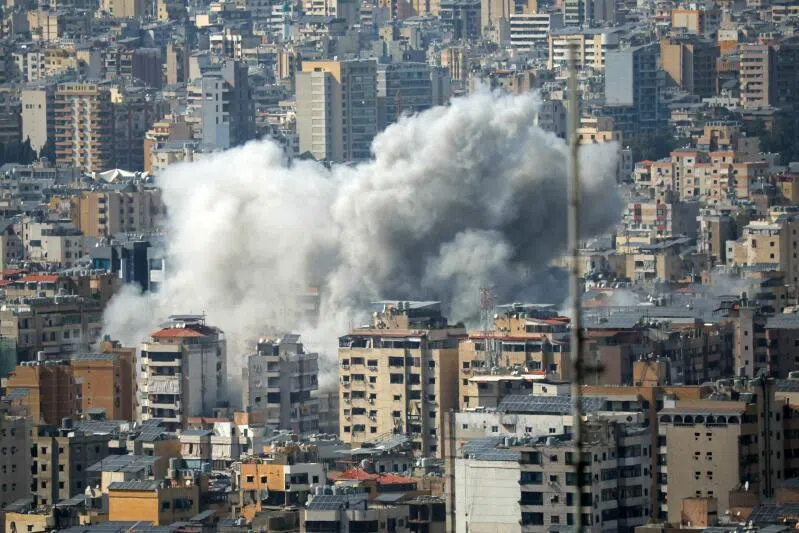 Smoke rises from the site of an Israeli strike in Beirut's southern suburbs, on April 5, 2026. 