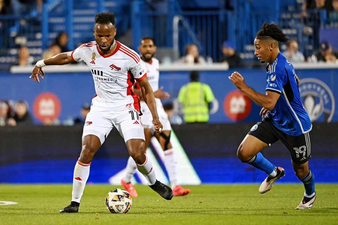 Sep 28, 2024; Montreal, Quebec, CAN; San Jose Earthquakes forward Jeremy Ebobisse (11) moves the ball against CF Montreal midfielder Nathan-Dylan Saliba (19) during the first half at Stade Saputo. David Kirouac-Imagn Images/File Photo