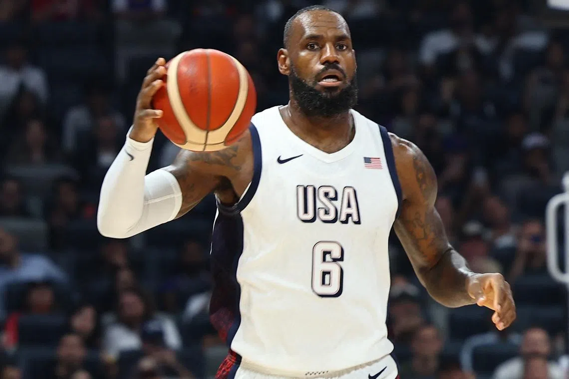 FILE PHOTO: Basketball - USA Basketball Showcase - United States v Serbia - Etihad Arena, Abu Dhabi, United Arab Emirates - July 17, 2024 LeBron James of the U.S. in action REUTERS/Rula Rouhana/File Photo