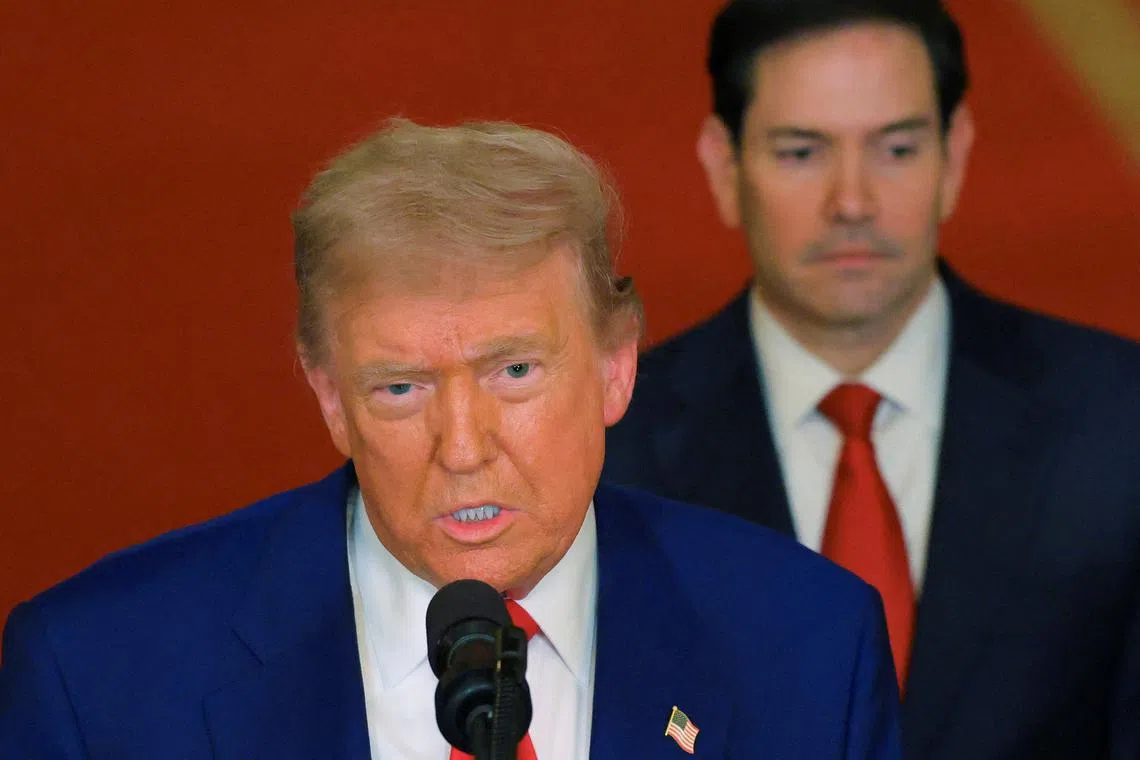 FILE PHOTO: U.S. President Donald Trump delivers an address to the nation, accompanied by U.S. Secretary of State Marco Rubio, at the White House in Washington, D.C., U.S. June 21, 2025, following U.S. strikes on Iran's nuclear facilities. REUTERS/Carlos Barria/Pool/File Photo