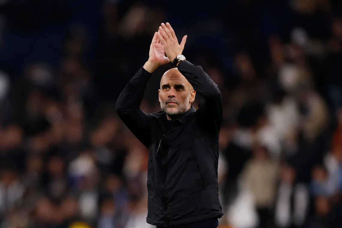 Soccer Football - UEFA Champions League - Real Madrid v Manchester City -  Santiago Bernabeu, Madrid, Spain - December 10, 2025  Manchester City manager Pep Guardiola celebrates after the match Action Images via Reuters/Andrew Couldridge