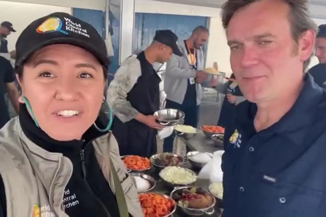 Australian World Central Kitchen (WCK) aid worker Lalzawmi \"Zomi\" Frankcom, who was among the WCK employees, including foreigners, killed in an Israeli airstrike according to the Hamas-run Gaza government media office, while the Israeli military, commenting on the reports, said it was conducting a thorough review at the highest levels to understand the circumstances of what it called a tragic incident, is seen at what is said to be a WCK kitchen, in a location given as Deir Al-Balah, in this screengrab from a video released March 25, 2024.     World Central Kitchen/Handout via REUTERS