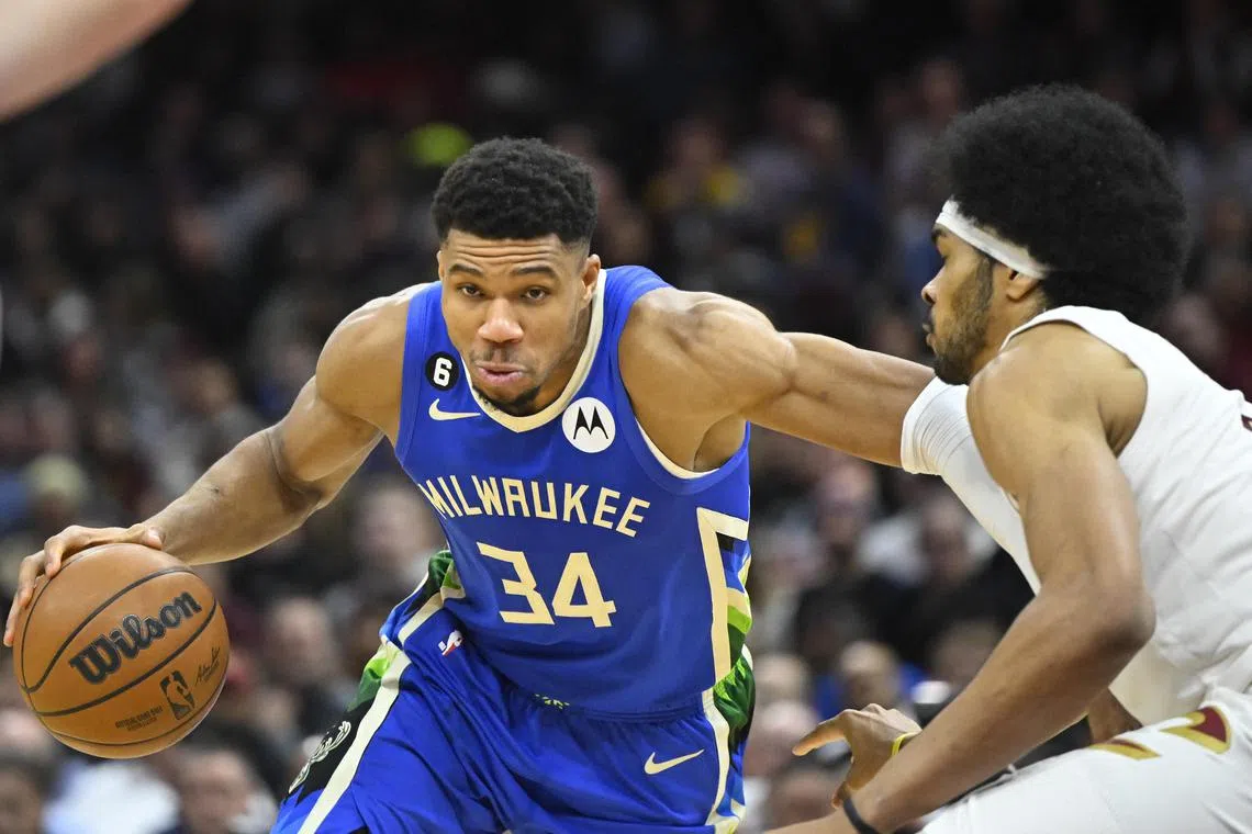 Milwaukee Bucks forward Giannis Antetokounmpo (left) during the fourth quarter against the Cleveland Cavaliers on Dec 21.