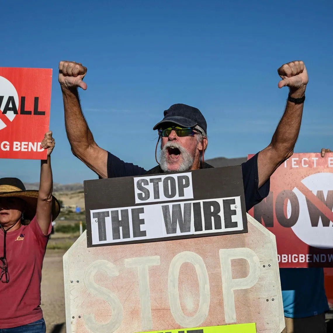 People protesting the plans by US President Donald Trump’s administration to build a section of the border wall at the Big Bend National Park in Study Butte, Texas, on Aug 15.