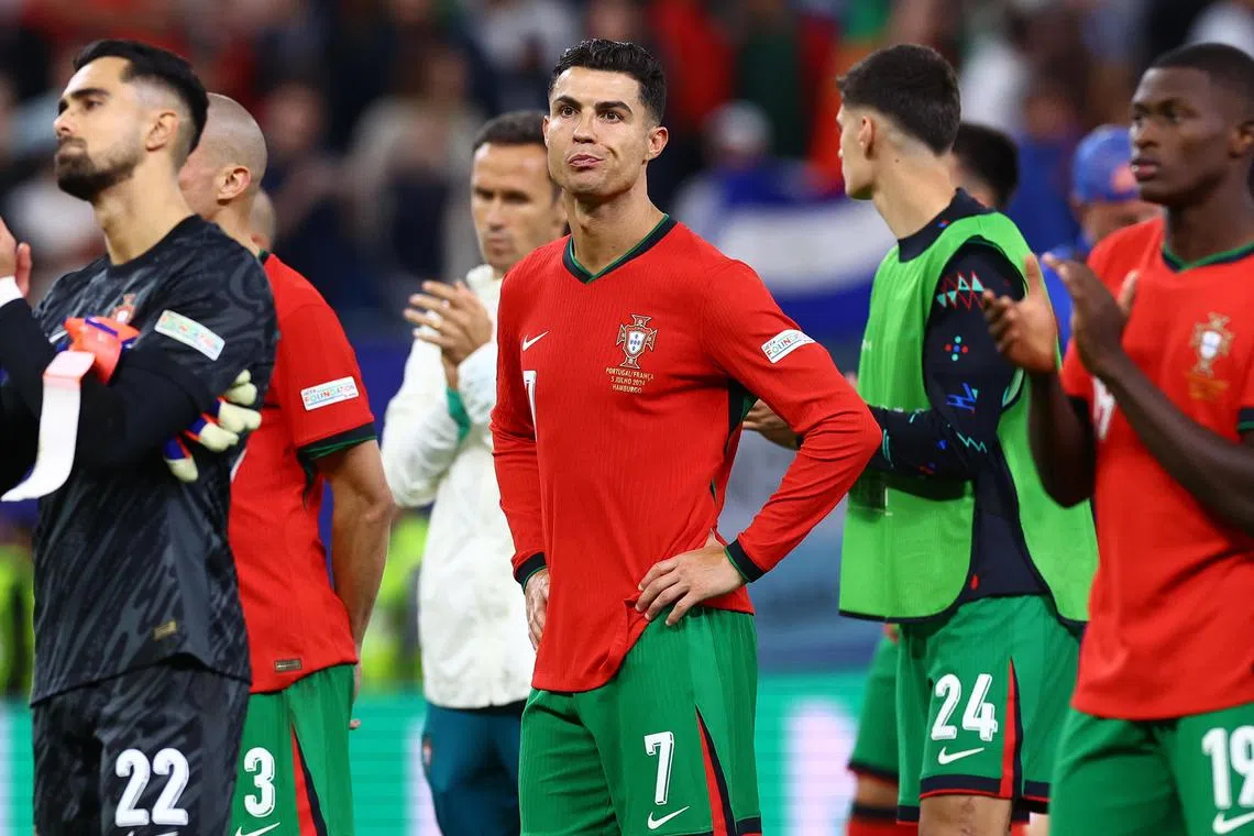 Cristiano Ronaldo looking dejected after Portugal lost the penalty shoot-out of their Euro 2024 quarter-final against France.