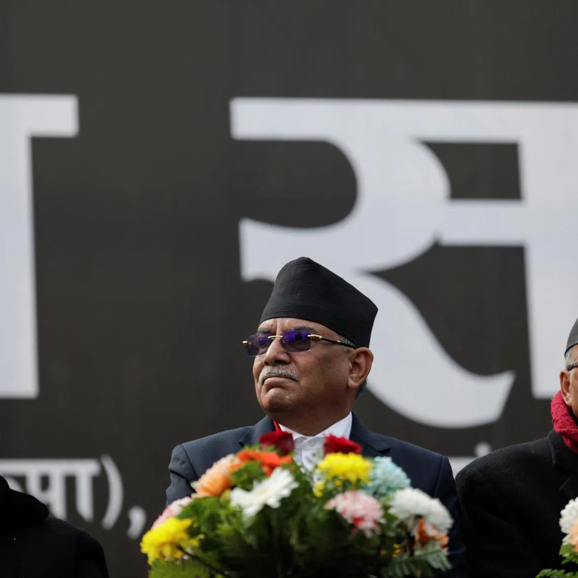 Former Prime Ministers Pushpa Kamal Dahal, also known as Prachanda, along with Madhav Kumar Nepal and Jhala Nath Khanal, who are opposing the current Prime Minister Khadga Prasad Sharma Oli, also known as K.P. Oli, take part in a mass gathering against the dissolution of parliament, in Kathmandu, Nepal February 10, 2021. REUTERS/Navesh Chitrakar/ File Photo