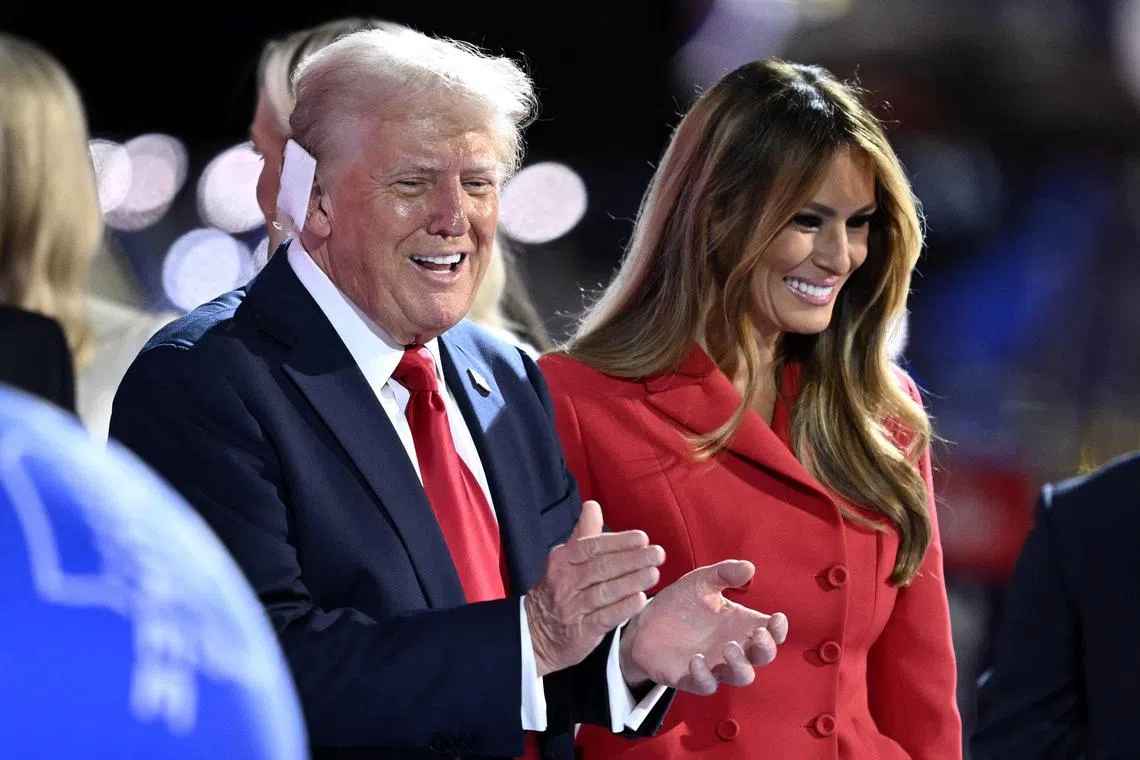 Former US President and 2024 Republican presidential candidate Donald Trump is joined by Former US First Lady Melania Trump after accepting his party's nomination on the last day of the 2024 Republican National Convention at the Fiserv Forum in Milwaukee, Wisconsin, on July 18, 2024. Days after he survived an assassination attempt Trump won formal nomination as the Republican presidential candidate and picked Ohio US Senator J.D. Vance for running mate. (Photo by ANGELA WEISS / AFP)