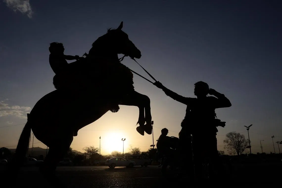 A man riding a horse at a public square in Sana'a, Yemen, June 11, 2026.