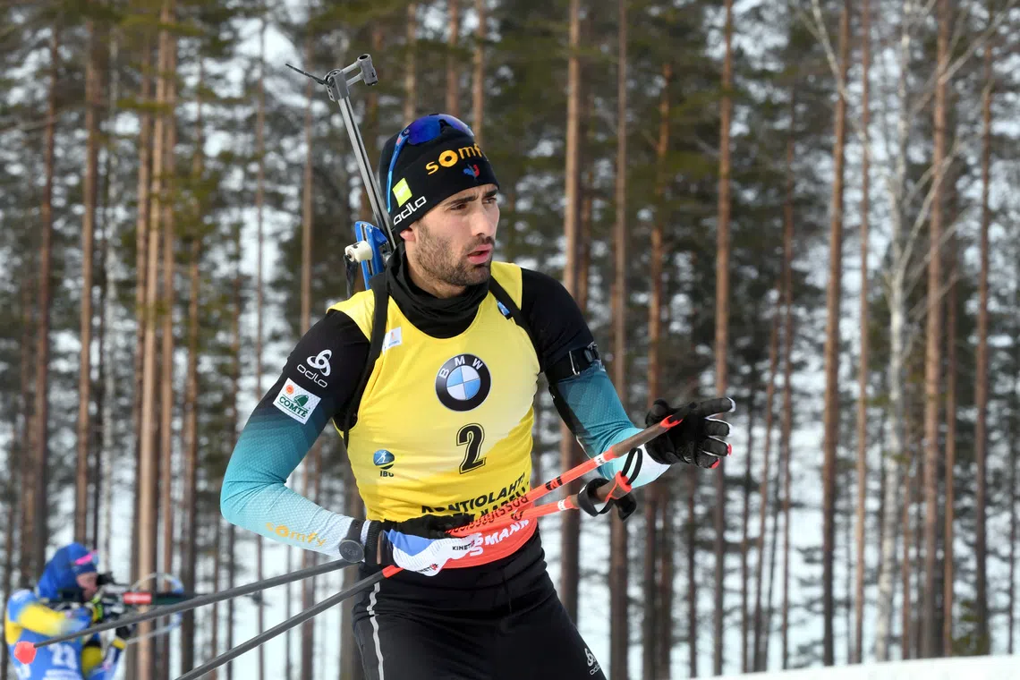 FILE PHOTO: Biathlon - IBU Biathlon World Cup - Men 12.5 km Pursuit Competition - Kontiolahti, Finland, March 14, 2020 Martin Fourcade of France warms up ahead of the competition. Lehtikuva/Jussi Nukari via/ File Photo