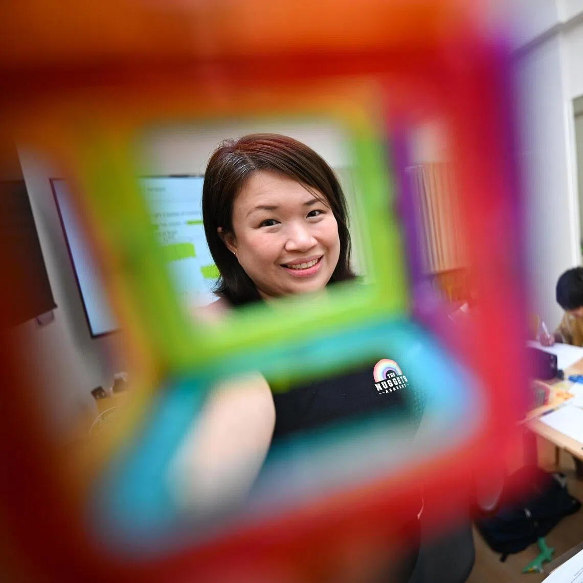 Ms Sandra Lim, head coach and founder of The Nuggets Academy, teaching a class of P6 pupils.
