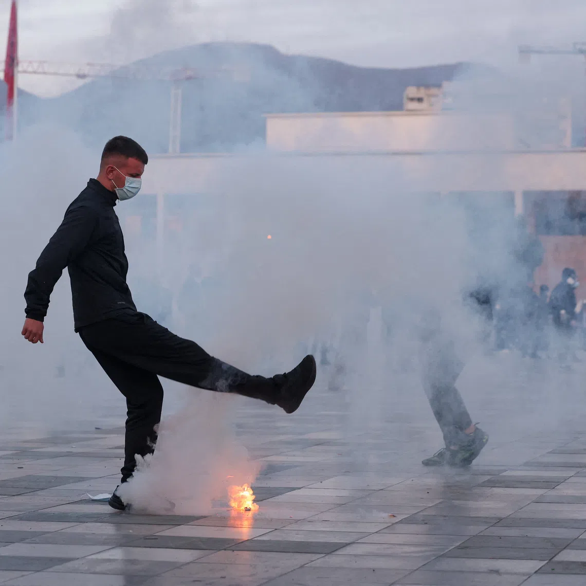 Tear gas, water cannons and rubber bullets were used to disperse protesters in Tirana, Albania, on Oct 24.