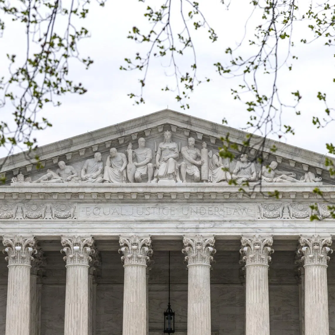 FILE PHOTO: The U.S. Supreme Court building during proceedings in pending appeals at the Supreme Court in Washington, D.C., U.S., March 30, 2026. REUTERS/Evelyn Hockstein/File Photo
